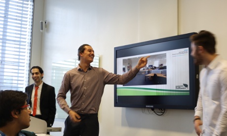 A student at Nottingham Business School makes a presentation to a business.