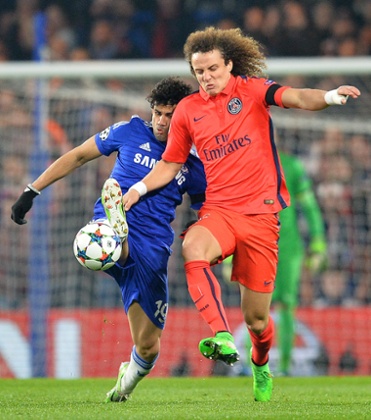 David Luiz and Diego Costa fight for the ball.