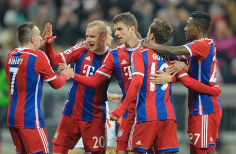 Franck Ribery, Sebastian Rode, Thomas Mueller, Mario Goetze and David Alaba celebrate their fourth goal.