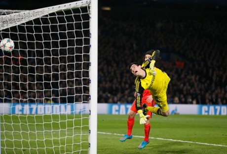 Thibaut Courtois has no chance as Thiago Silva scores the second goal for PSG.