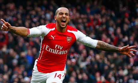 Theo Walcott celebrates his goal against Aston Villa at the Emirates.