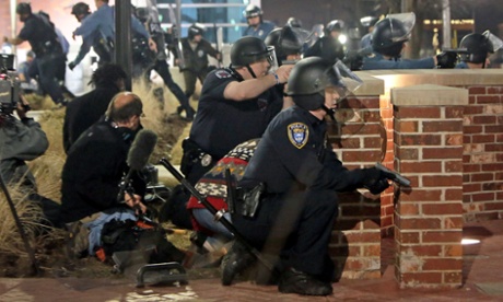 Officers outside Ferguson police HQ