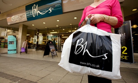 Shoppers walk past a shop belonging to high street retailer BHS, Norwich, Norfolk.