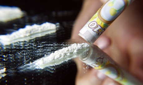 Cocaine being snorted.