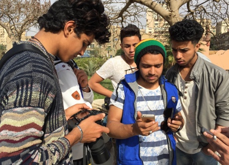 Photographer Medoz, surrounded by some of his Famous clients