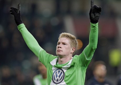 Kevin De Bruyne celebrates after scoring his side's third.