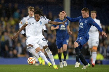 Dieumerci Mbokani leaves James McCarthy standing.