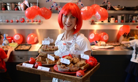 Samantha Cameron with a tray of cakes to be sold to staff at Downing Street to raise money for Red Nose Day