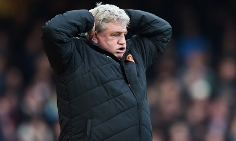 Steve Bruce watches on during Hull's 3-0 defeat at West Ham.