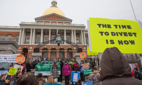 Environmentalists rally in Boston to demand state legislators support a bill that would require divestment from the state's fossil fuel holdings, 26th February 2014.