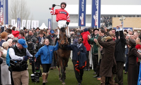 Nico de Boinville celebrates victory on Coneygree as they enter the winners' enclosure after the Gold Cup.