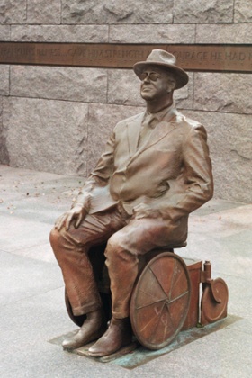 A memorial statue of former US president Franklin D Roosevelt in a wheelchair.