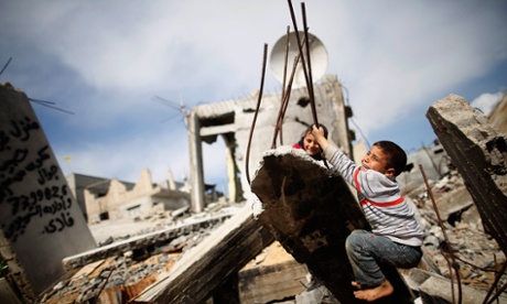 Palestinian children play in the rubble of a destroyed house in Gaza Strip. Should businesses be more concerned about the future of the world's children?