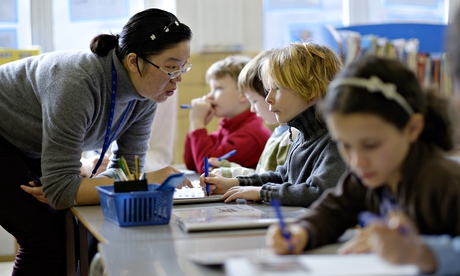 Lianjie Lu, a maths teacher from Shanghai, delivers a lesson to year 3 pupils at Fox primary school 