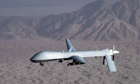 An undated handout picture by the US Air Force shows a MQ-1 Predator unmanned aircraft in flight at an undisclosed location.