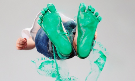 Feet covered in green paint