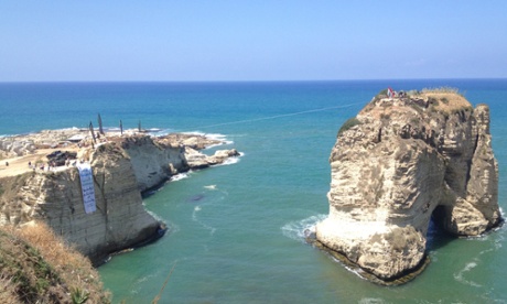Acitivists from the Save Dalieh campaign hung banners protesting developmet at Dalieh and Beirut's famous pigeon rocks (right)