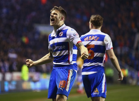 Jamie Mackie celebrates scoring his team's third.