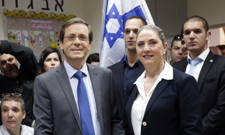 Israeli Labour party Yitzhak Herzog casts his ballot with his wife Michal