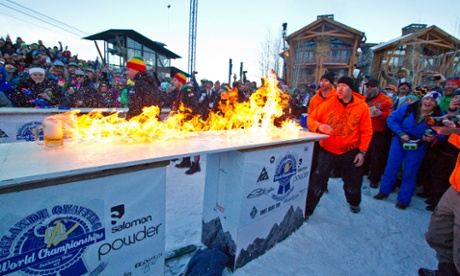 Team Storm Show lights the 10-ft bar top on fire during the final round of the 8th Annual Gelande Quaff World Championship in Jackson, Wyoming.