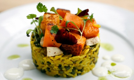 Cylindrical curried root vegetable and smoked tofu kedgeree with puy lentils and soft-boiled quail's eggs.