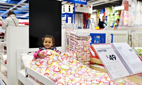 Girl on bed in Ikea