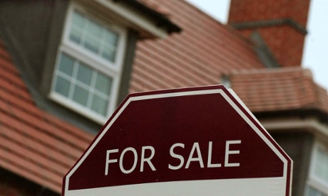 For sale sign outside a house.