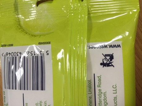 A Wet Ones packet with advisory logo.