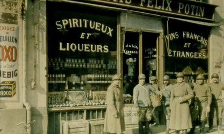 French infantrymen, informally known as Poilus or Hairy Ones, outside wine shop, France, 1916