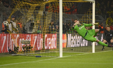 The ball flies past Roman Weidenfeller, who was a wee bit tardy reacting to Tevez's shot ...