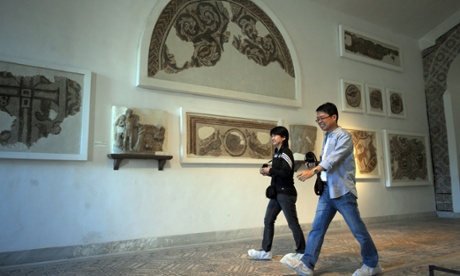 Japanese tourists visiting the museum in 2013 .