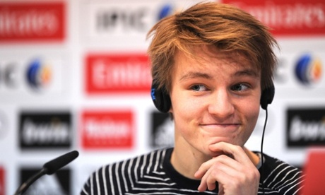 Martin Odegaard ponders a question during his press conference at Real Madrid's Valdebebas training ground.