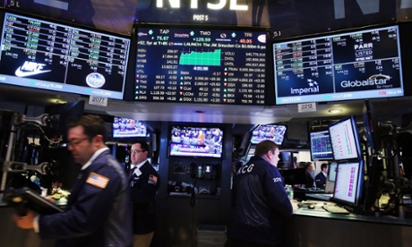 Traders work on the floor of the New York Stock Exchange.