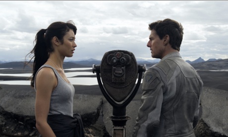 Olga Kurylenko and Tom Cruise as Julia and Jack Harper in Oblivion