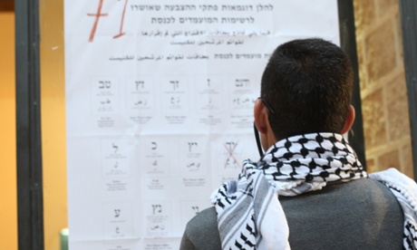 Man looks at election results