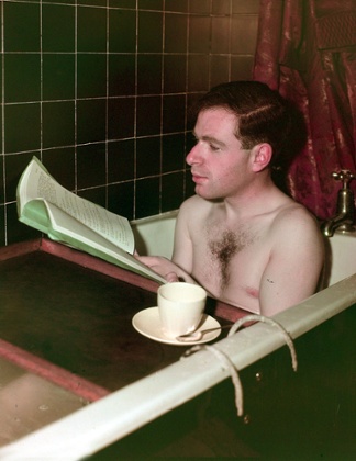Immersed … Peter Brook reading a script in the bath, 1949.