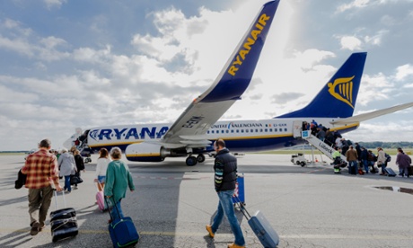 Passengers board a Ryanair flight. Monday's announcement heralded Ryanair flights between European and US cities, including New York, Boston, Chicago and Miami from London Stansted, Dublin and Berlin.