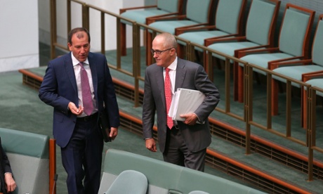 Communications minister Malcolm Turnbull talks to Mal Brough.