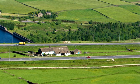 M62 Stott Hall Farm very near the highest point on the M62 crossing the Pennines