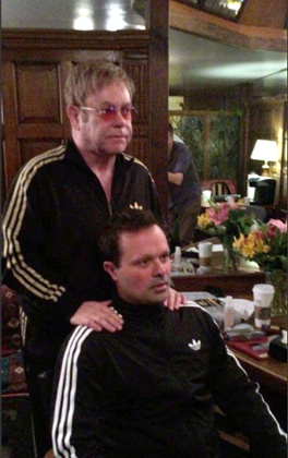 Elton John and Evgeny Lebedev: both look stunned by the result