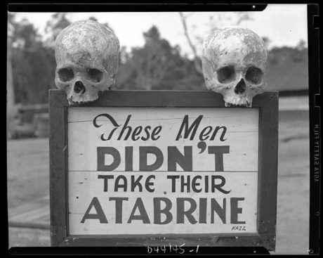 An anti-malaria drug sign in Guinea from the second world war.