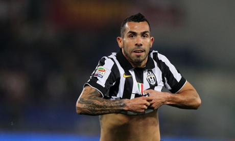 Carlos Tevez celebrates after scoring the opener for Juventus.