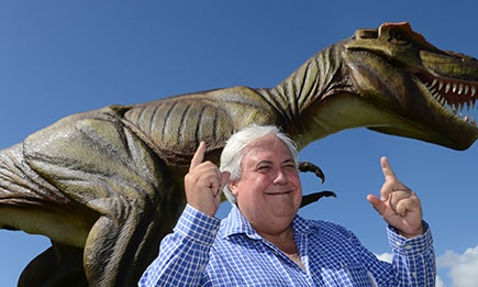 Clive Palmer and the late T-Rex, Jeff, destroyed by fire overnight.