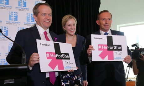 Tony Abbott and Opposition leader Bill Shorten sign the He for She challenge with executive director of the UN national committee for women, Julie McKay.