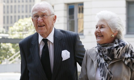 In this Nov. 4, 2014 file photo, former Australian Prime Minister Malcolm Fraser, left, arrives at Town Hall with his wife Tamie for a memorial service for former Australian Prime Minister Gough Whitlam in Sydney.