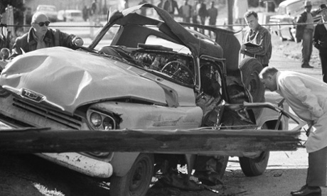 Natchez police and agents from the FBI inspect the truck that exploded in a bomb blast and killed Wharlest Jackson on 28 February 1967.