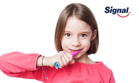 Young girl brushing teeth