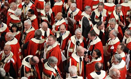 Peers leave the House of Lords following the state opening of Parliament.