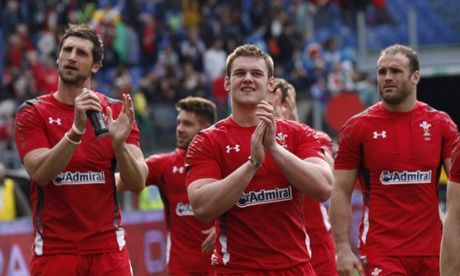 The Wales players soak up a well deserved round of applause as they complete their lap of honour.  They have a tense couple of hours ahead of them whilst they see how Ireland and England get on in their respective matches.