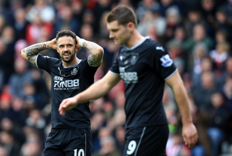 Burnley's Danny Ings, left, can't believe it after team-mate Sam Vokes, right missed to score.
